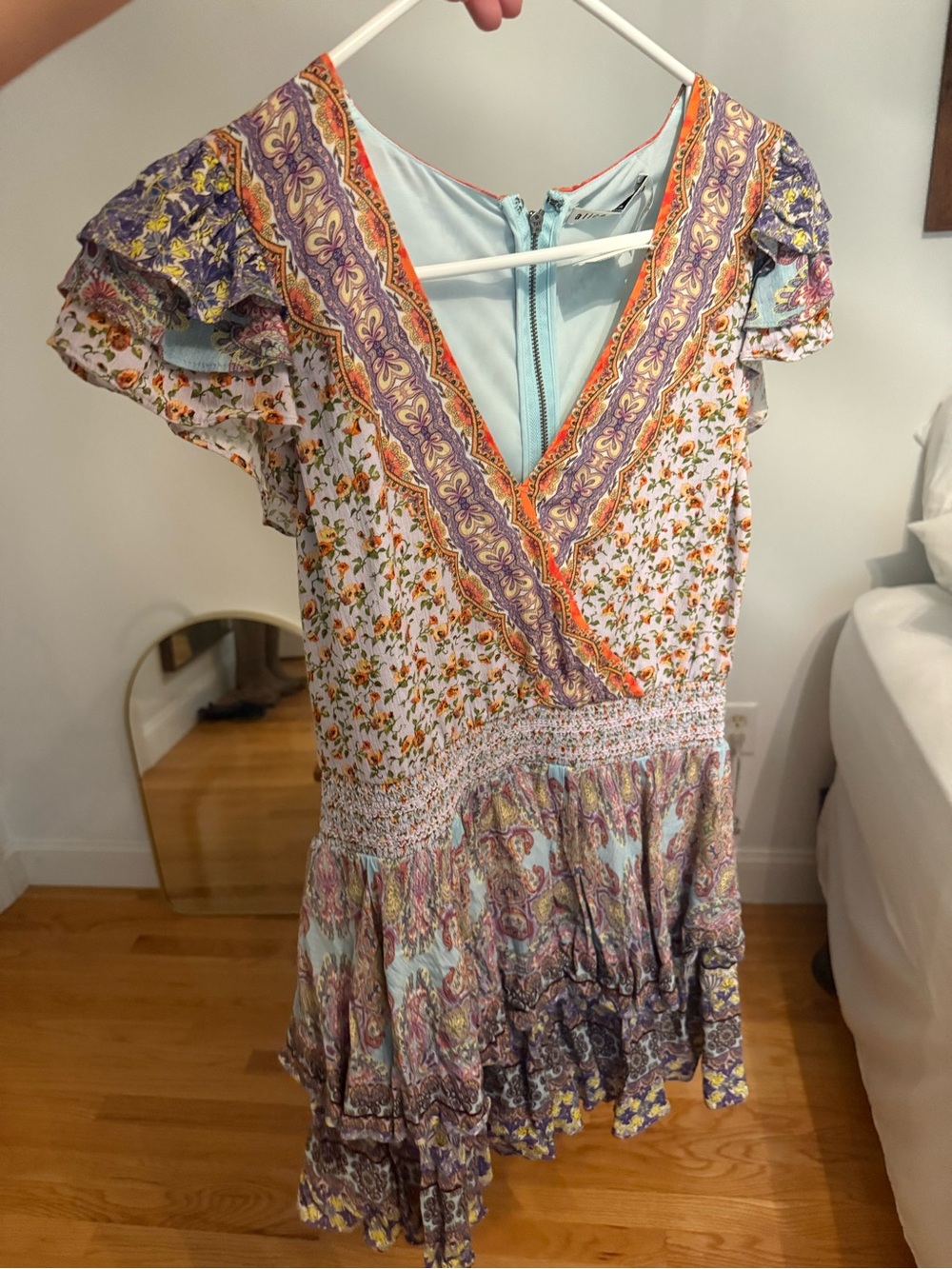 Alice + Olivia Lavender Floral V‑Neck Smocked Mini Dress